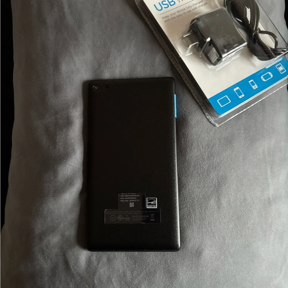 Lenovo “ Tab 7” tablet. Includes brand new charger in box.